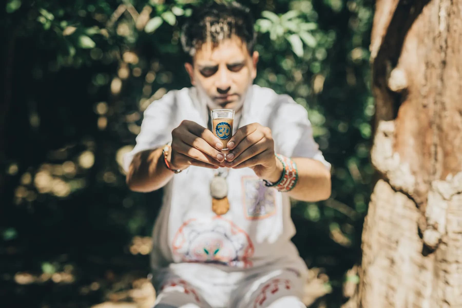 Jayesh Mitha holding a ceremonial Ayahuasca cup